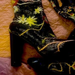 Used black  multiple color high heel boots